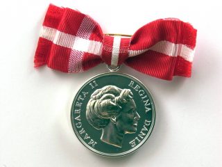 Einar får dronningens fortjenstmedalje